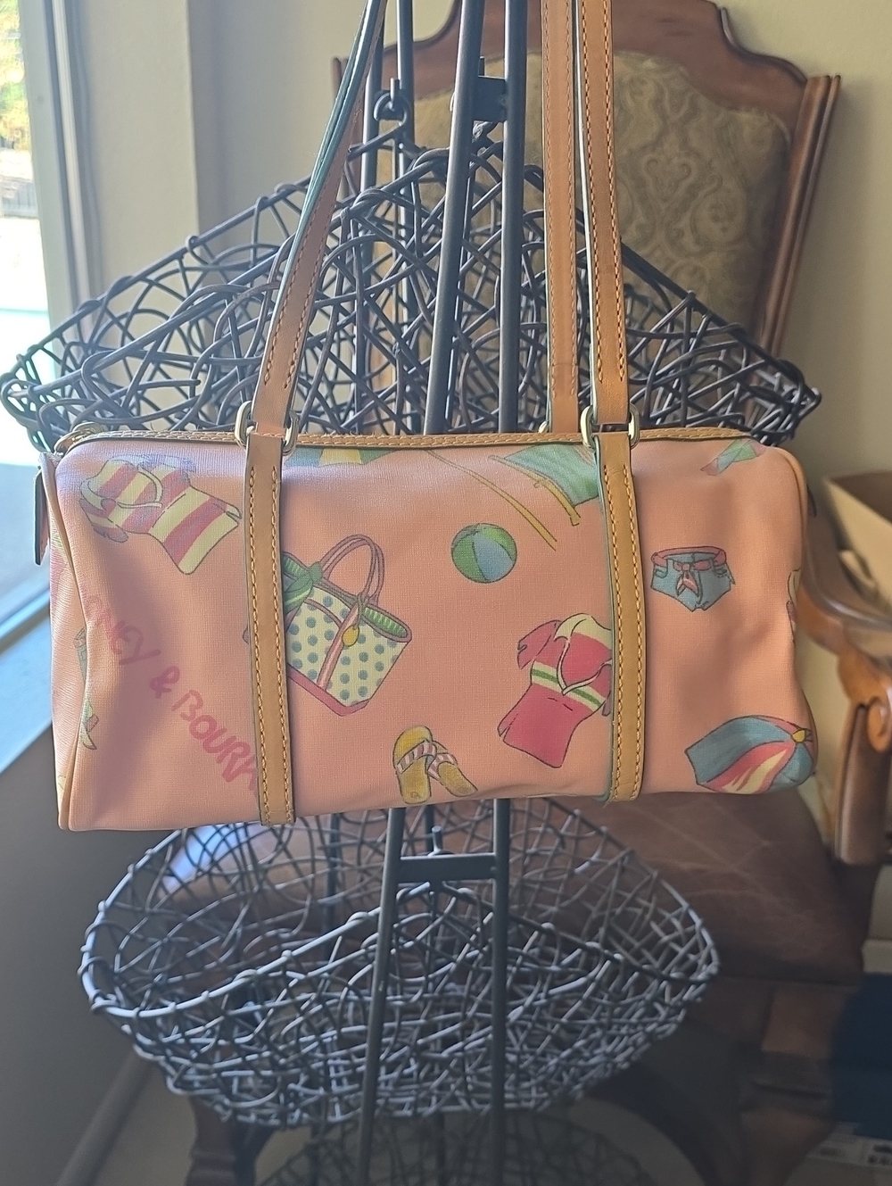 Vintage pink Dooney & Bourke barrel bag from their Miami beach collection